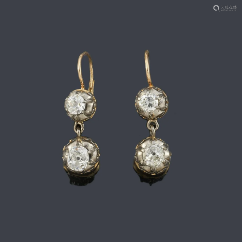 Long earrings with four antique cushion cut diamonds of
