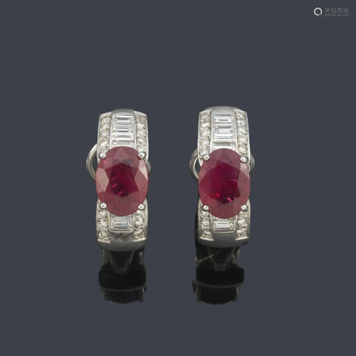 Creole earrings with a pair of oval cut rubies of
