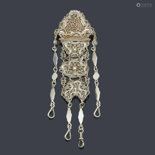 Chatelaine silver with filigree floral motifs.