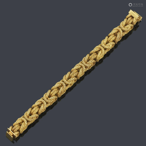 Bracelet made with 18K yellow gold braided threads in