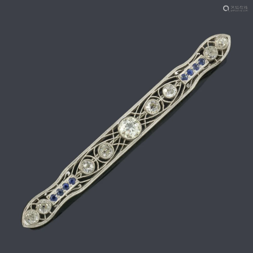 Platinum bar clasp with old-cut diamonds and sapphires.