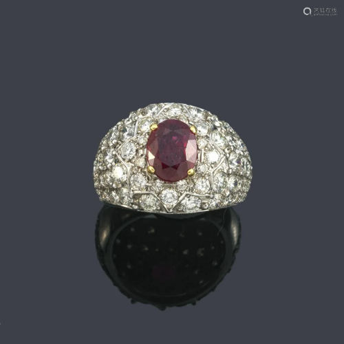 Bombé ring with oval cut ruby of