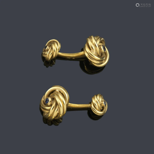 Knot-shaped cufflinks with central sapphire in 18K