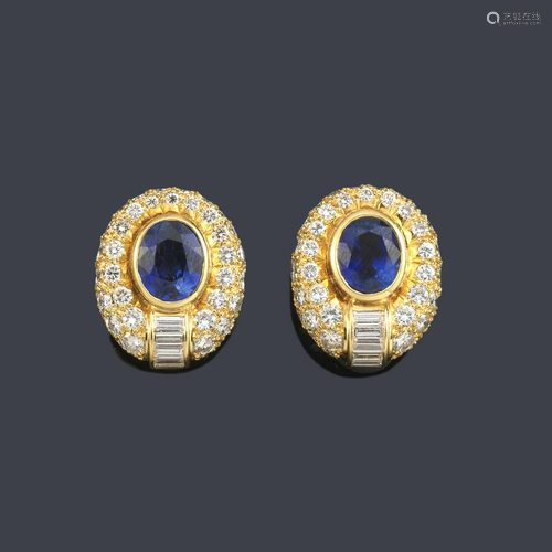 Short earrings with a pair of oval cut sapphires of