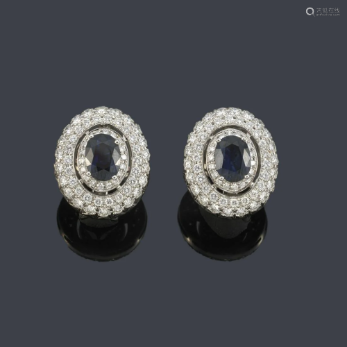 Short earrings with a pair of oval cut sapphires of