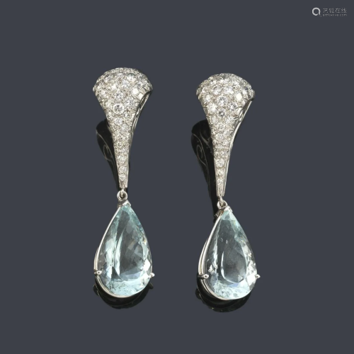 Long earrings with a pair of knob-cut aquamarines of