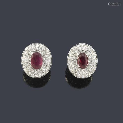 Short earrings with a pair of oval cut rubies of