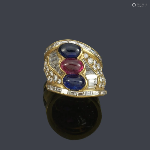 Wide ring with two sapphire cabochons and one ruby