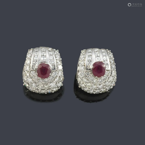 Short earrings with a pair of oval cut rubies of