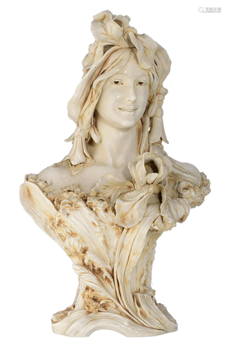 An Art Nouveau Royal Dux bust of a young lady, H 44,5