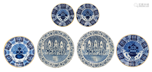 A collection of blue and white Delftware dishes and