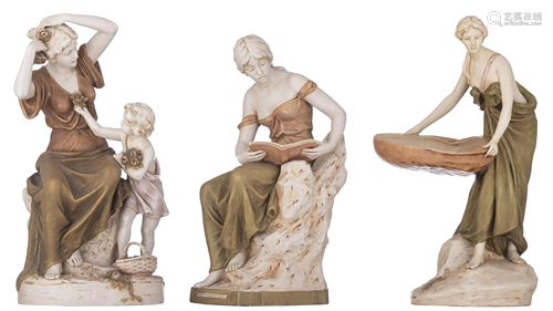 A collection of three Royal Dux biscuit figurine groups