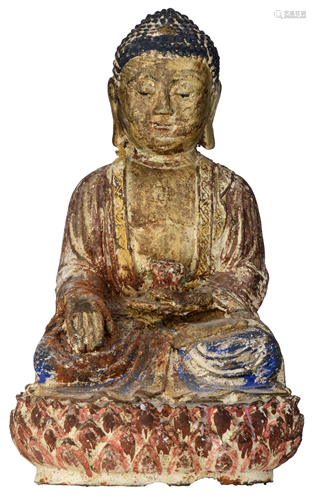 A polychrome painted cast-iron figure of a seated