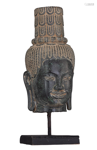 A rare Khmer bronze head of a deity, Banteay Srei