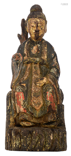 A Chinese polychrome decorated wooden sculpture of a