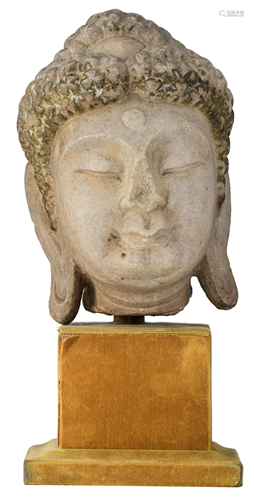 A rare Chinese limestone head of Buddha Shakyamuni, H