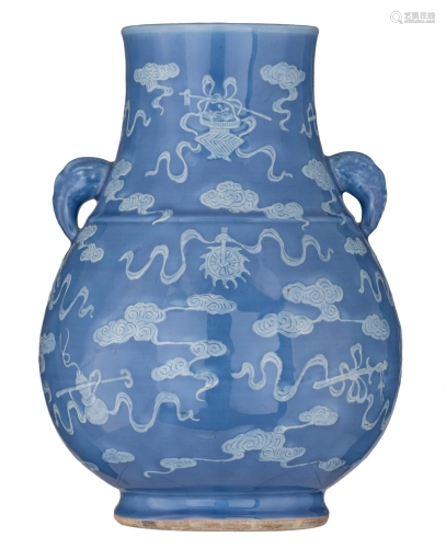 A Chinese pale blue glazed hu vase with slip