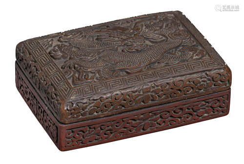 A Chinese carved wood and red painted box and cover,