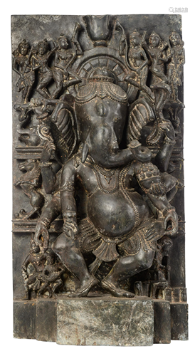 A large alto-relievo stone sculpture of the Hindu deity