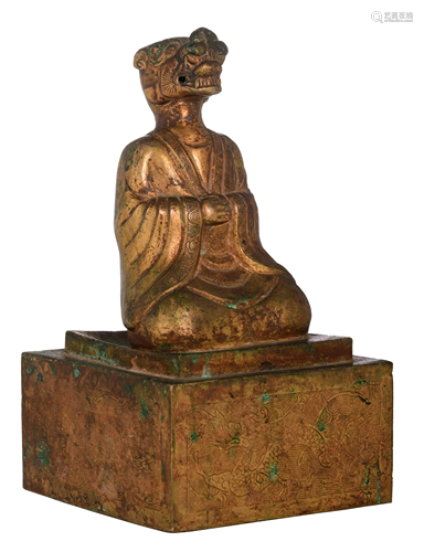 An oriental gilt-bronze figure of a Buddhist disciple