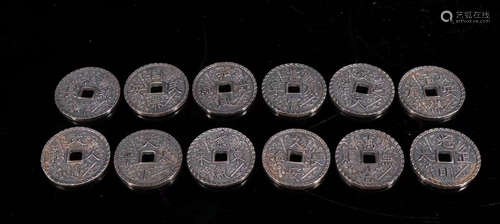 SET OF QIANLONG MARK SILVER CARVED COINS