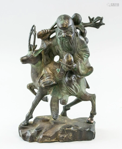 Chinese Bronze Shou Xing Seated on Deer