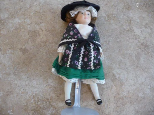 VINTAGE PORCELAIN DOLL OF THE WORLD DOLL