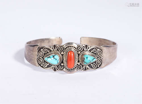 A Coral and Turquoise Inlaid Silver Bangle