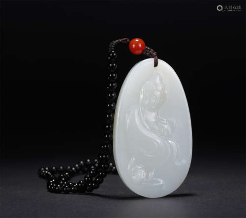 A Carved White Jade Guanyin Pendant