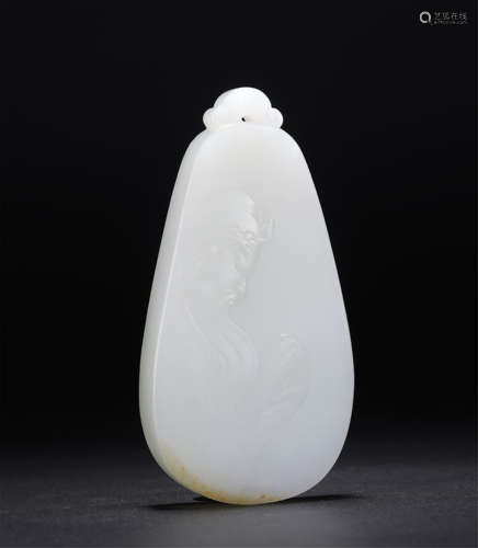 A Carved White Jade Guandi Pendant