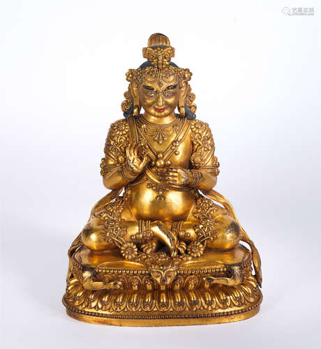 A Gilt-bronze Seated Jambhala