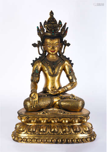 A Gilt-bronze Seated Crowned Buddha