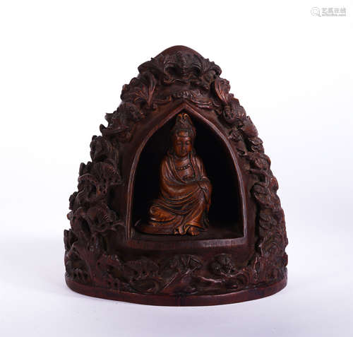 A Carved Bamboo Seated Guanyin