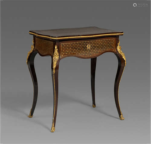 A Napoleon III Ormolu Mounted Wooden Writing Table