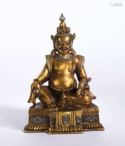 A Gilt-bronze Seated Vaishravana