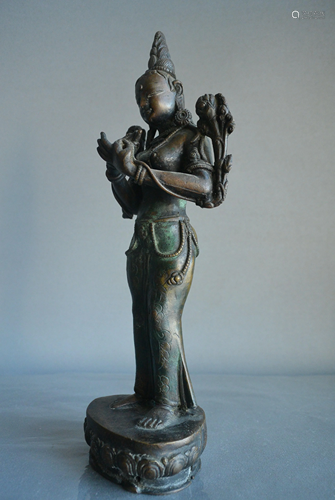 A finely bronze green Tara, H24.5cm.