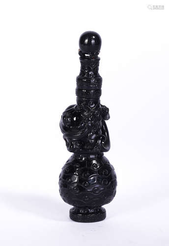 A Carved Smoky Quartz Vase