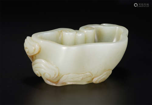 A Carved White Jade Ruyi Shaped Washer