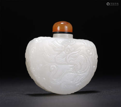 A Carved White Jade Snuff Bottle