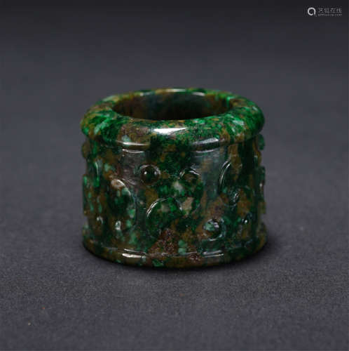 A Carved Jadeite Archer Ring