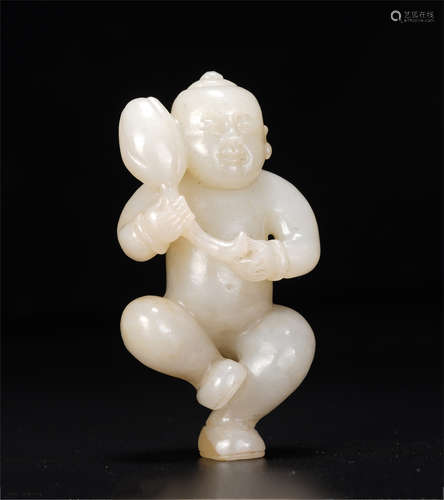 A Carved White Jade Kid