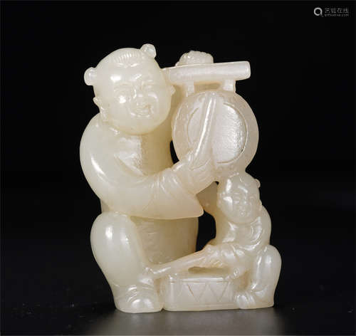 A Carved White Jade Kids Group