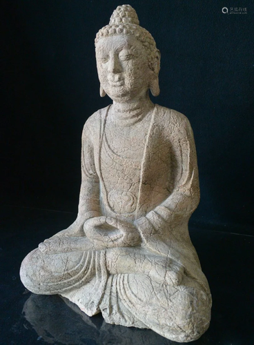 A CARVED STONE BUDDHA STATUES. China Ancient times