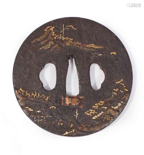 JAPON.Tsuba marugata en fer à décor incrusté d'une barque da...