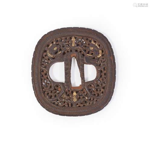 JAPON.Tsuba kakugata en fer ajouré de type namban à décor de...