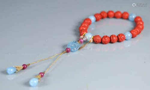 RED LACQUER STRING BRACELET WITH 18 BEADS