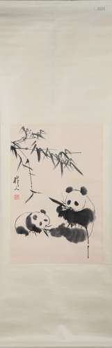 A CHINESE PAINTING OF PANDAS AND BAMBOOS