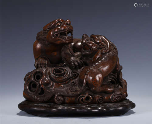 A CARVED CHENXIANG BEASTS GROUP