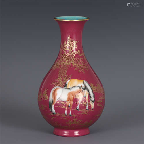 A CHINESE RED GROUND GOLD ENAMELED VASE