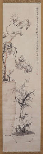 A CHINESE PAINTING OF FLOWERS AND BAMBOOS